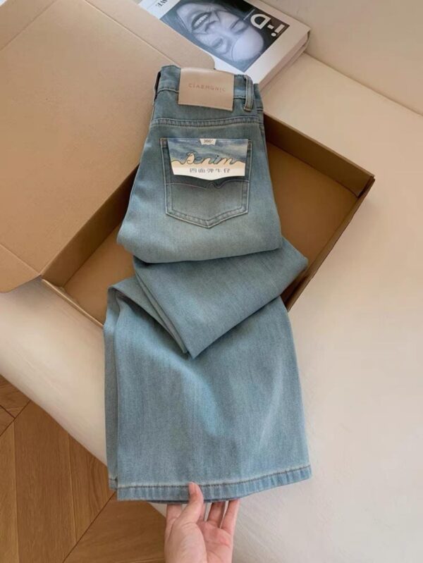 بنطال جينز واسع الساقين أزرق فاتح بتصميم عصري للجنسين | Wide-Leg Denim Jeans